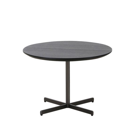 Sculpturally round side table with four legs