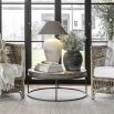 Circular coffee table with black metal frame and wooden tabletop