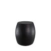 Textured black metal side table with bulging silhouette