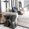 Aluminium side table with twist design in antique lead finish