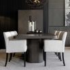 Dining table with rounded edges and base in dark grey