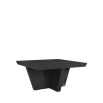 Bold black wood coffee table with square silhouette and tapered base