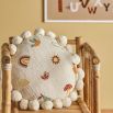 Round cushion with cute embroidered images and soft round tassels bordering