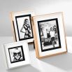 A gorgeous deep framed picture frame with a rose gold finish