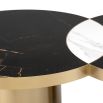 Black and white marble overlapping coffee table with eclipse-like detail and brass base