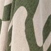 Green and white patterned cotton throw with tassles