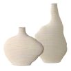 Set of two vases with ribbed design and asymmetric silhouette.