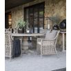 Wooden outdoor dining table with ornate base in charcoal finish