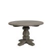 Wooden outdoor dining table with ornate base in charcoal finish