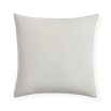 White cushion with yellow doves design 