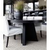 Extendable black wood round dining table with interlocked legs