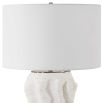 Cream lamp with mesmerising organic shaped base and cream shade.