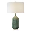 Table lamp with green glossy base and cream shade