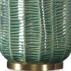 Table lamp with green glossy base and cream shade