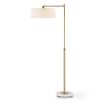 Delicate gold floor lamp with marble base and white shade