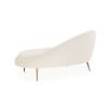 Elegant chaise longue upholstered in cream boucle with brass stiletto legs