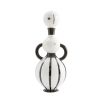 A stylish decanter by Jonathan Adler with a curvaceous silhouette and gold accents