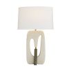 Stone textured table lamp with grey stone element and brass accents