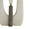 Stone textured table lamp with grey stone element and brass accents