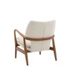 Stunning armchair with wooden frame and boucle seat pads