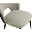 Elegant dining chairs with light grey velvet upholstery and quilted dark grey back