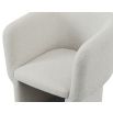 Boucle sand dining chair with cradling seat and back