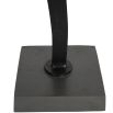 Curved and twisted sculpture in matte black