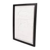 Cream coloured abstract wall art in a black frame 