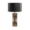 Antique brass finish table lamp with curve details