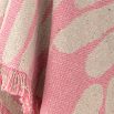 Pink and cream throw with fringing details