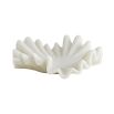 Ruffled centrepiece crafted from white ricestone