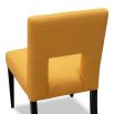 Dining chair with square cut out shape in backrest and luxurious mustard linen upholstery