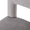 Light grey dining chair with square cut out shape in backrest and luxurious linen upholstery