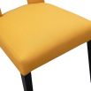 Dining chair with square cut out shape in backrest and luxurious mustard linen upholstery