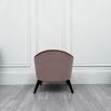 Mid-Century inspired armchair with two materials and contrasting black ash legs  