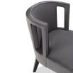 Grey chair with softly curved backrest and cut-out feature