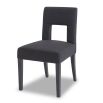 Dark grey dining chair with square cut out shape in backrest and luxurious linen upholstery