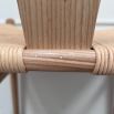 Set of three natural birch wishbone dining chairs