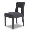 Dark grey dining chair with square cut out shape in backrest and luxurious linen upholstery