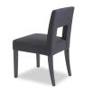 Dark grey dining chair with square cut out shape in backrest and luxurious linen upholstery