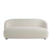 Elegant rounded boucle sofa with subtle wingback