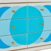 White console table with blue circle pattern