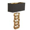 Table lamp with stacked brass shapes stem and rectangular black shade