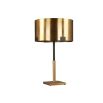 Tall table lamp with brass base and shade