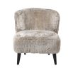 Dreamy accent chair with fur upholstery and black tapered legs