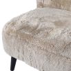 Dreamy accent chair with fur upholstery and black tapered legs