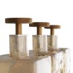 Organic shaped glass decanters with smoke luster finish and brass toppers