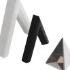 Overlapping stone and glass triangle sculptures