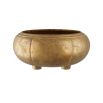 Gold bowl with three raised feet