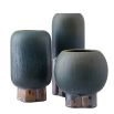 Set of 3 dark green vases with drip glaze detail